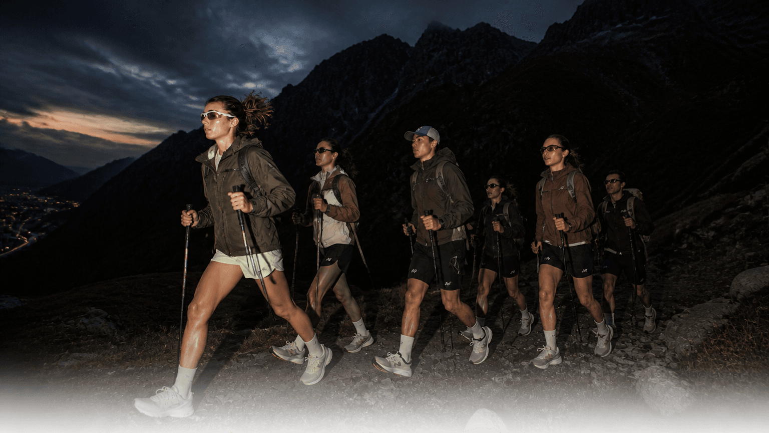 Hikers heading into the mountains at dusk